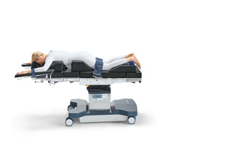 Patient lying straight on Maquet lyra operating table